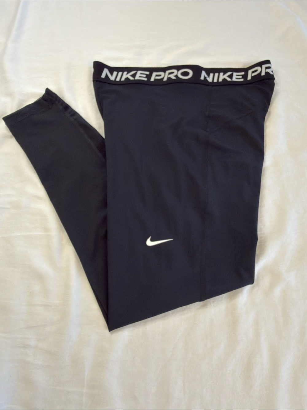 Nike Pro Black Dri-FIT Cropped Performance Leggings with White Logo Waistband